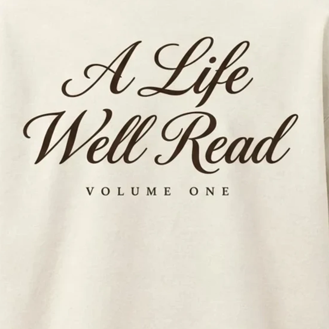 A Life Well Read back artwork close-up, espresso script on cream